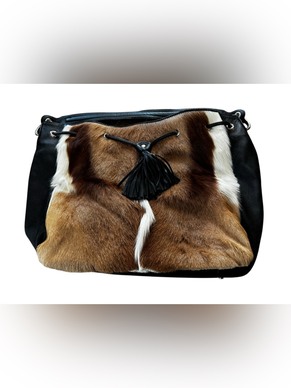 NWOTS Clever Carriage Company Fur and Leather Springbok Drawstring Shoulder Bag.